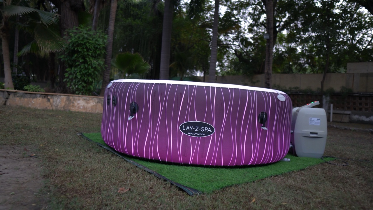 Lay-Z-Spa Hollywood illuminated hot tub glowing at night