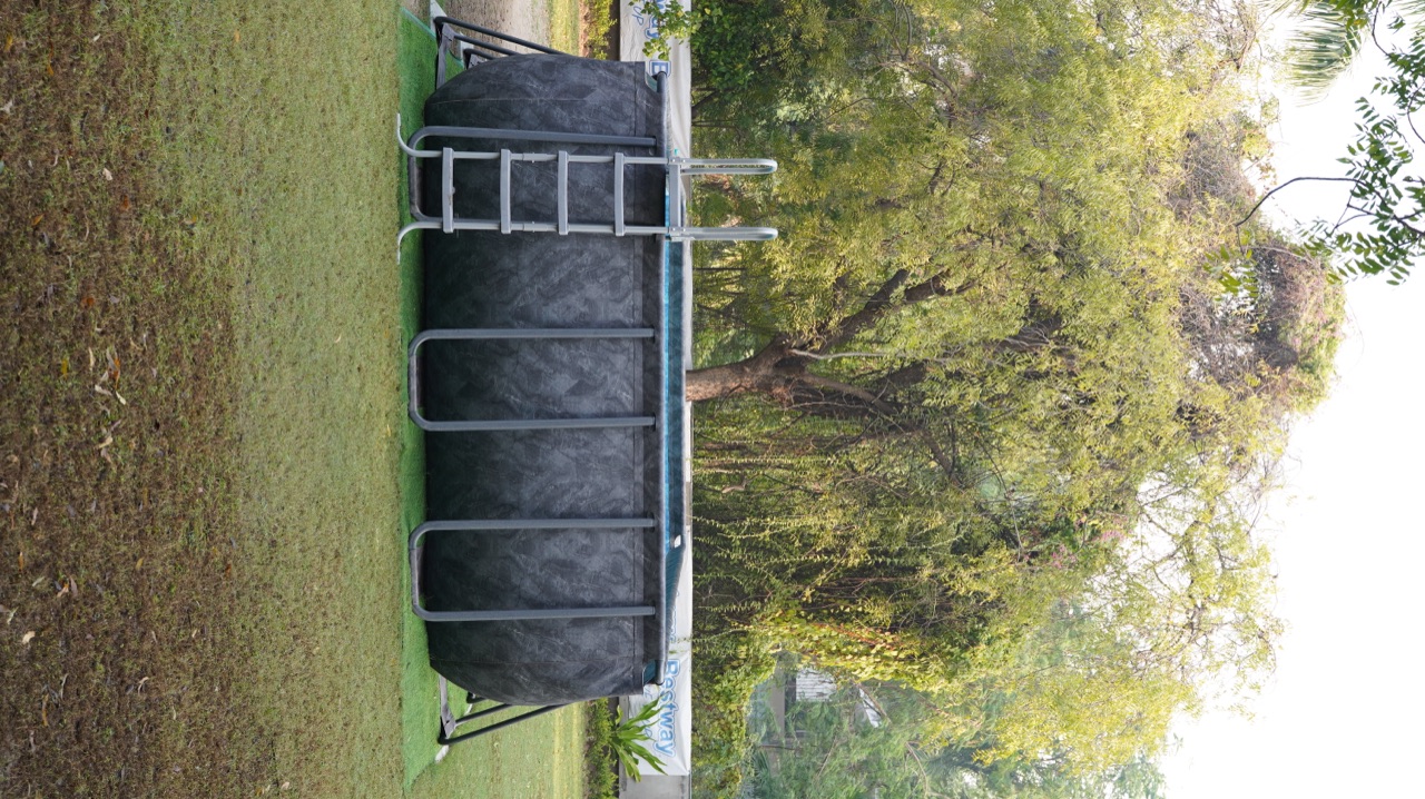 Portable Bestway swimming pools set up on lawn